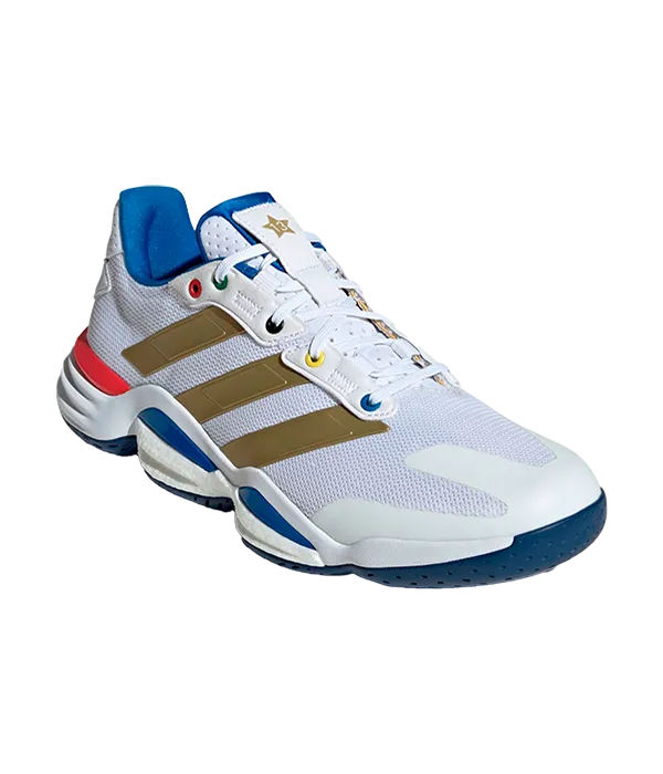 Zapatillas Adidas Stabil 16 Blanco/Dorado Karabatic lateral izquierdo